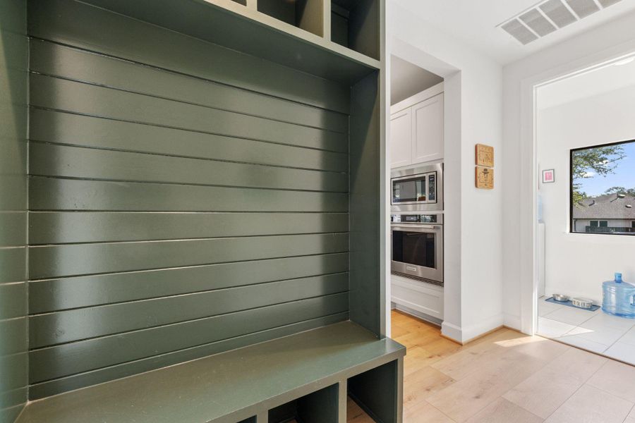 Mudroom featuring light wood-type flooring