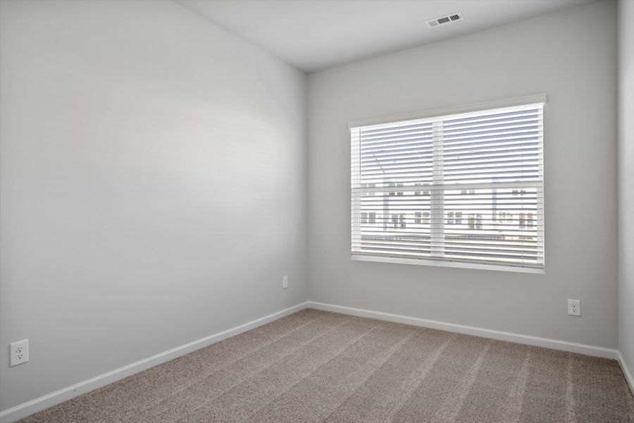 Spacious, unfurnished interior of a new home in West Main Townhomes, Sanford (Image 25).