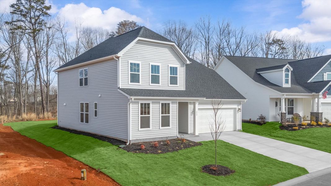 Front exterior of a new home in Fox Hollow, Spartanburg, SC, highlighting curb appeal (Image 20).