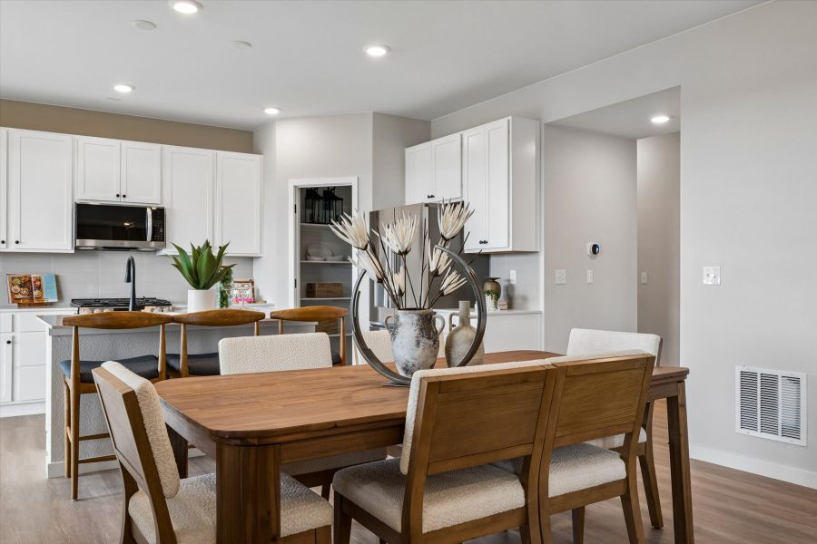 A kitchen with white cabinets. A kitchen with white cabinets.