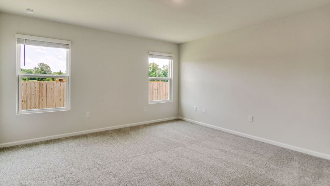 Spacious, unfurnished interior of a new home in The Enclave at Bar W Ranch, Baker (Image 20).
