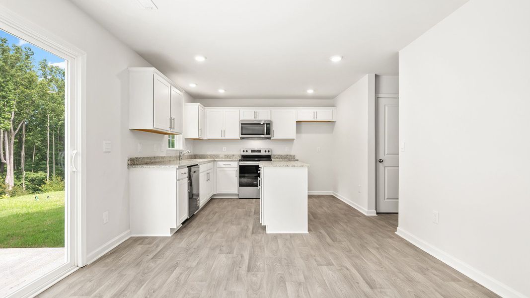 Furnished interior view inside a new home in Greystone North, Stoneville (Image 5).