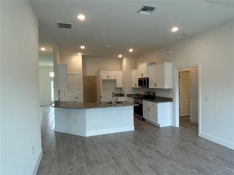 Furnished interior view inside a new home in Watercress Cove, North Port (Image 5). Furnished interior view inside a new home in Watercress Cove, North Port (Image 5).