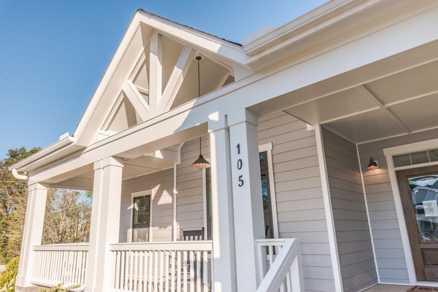 Representative exterior photo of a completed home built from the Sullivan by Bill Clark Homes in Osprey Landing, Southport, NC (Image 24). Representative exterior photo of a completed home built from the Sullivan by Bill Clark Homes in Osprey Landing, Southport, NC (Image 24).