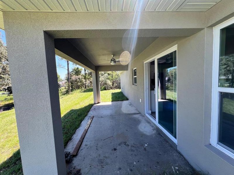 Exterior details and patio area of a home in , Citrus Springs (Image 3).