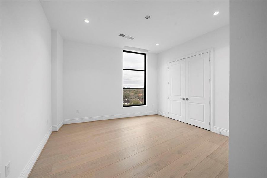 Second bedroom: Upgraded with wood floors (no carpet in the home) and 11 ft. ceilings.