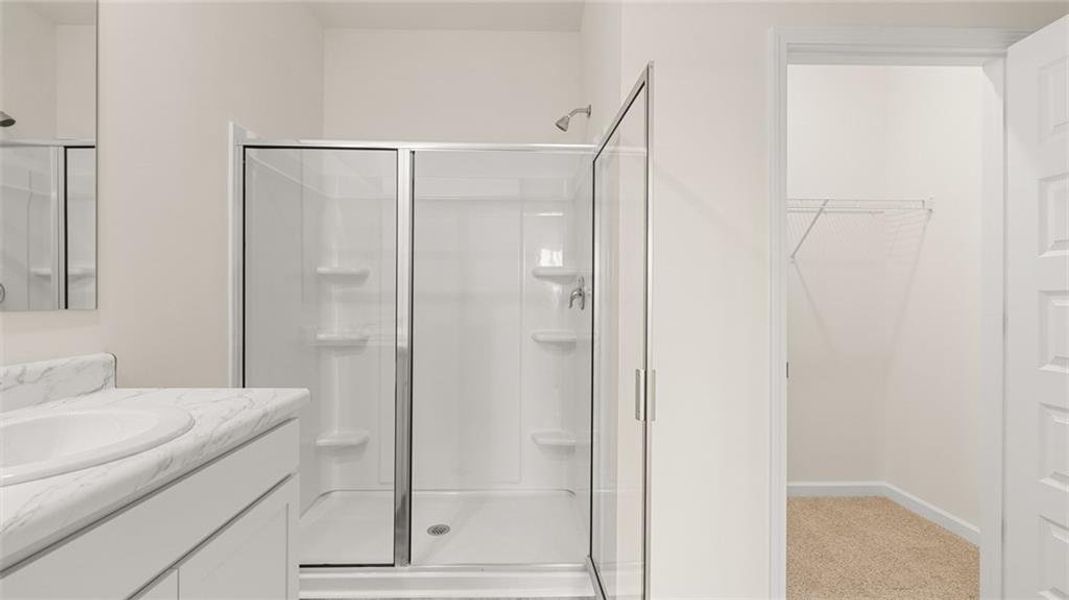 Furnished interior view inside a new home in Oakchase at Hampton, Hampton (Image 7).