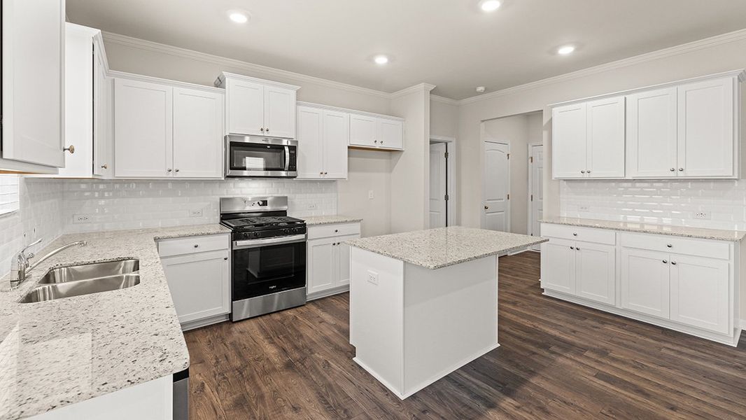 Representative furnished interior of a home built from the Mansfield by D.R. Horton in Northwoods at Mirror Lake, Villa Rica (Image 4).