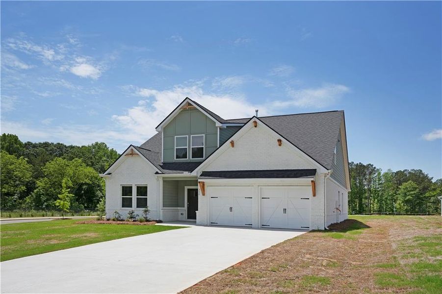 Front exterior of a new home in Conner Springs, Social Circle, GA, highlighting curb appeal (Image 2). Front exterior of a new home in Conner Springs, Social Circle, GA, highlighting curb appeal (Image 2).