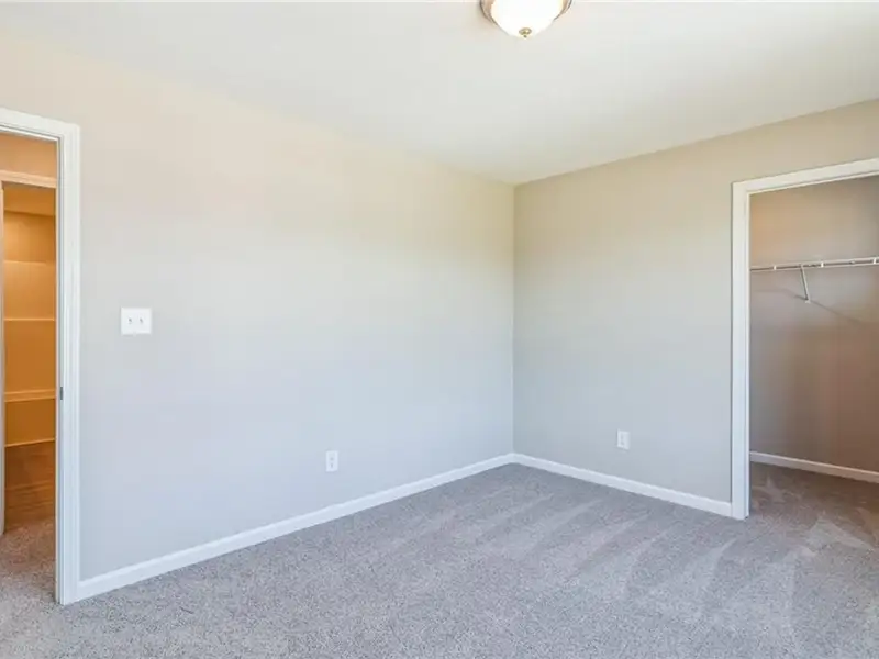 Spacious, unfurnished interior of a new home in Ivy Glen, Perry (Image 9).