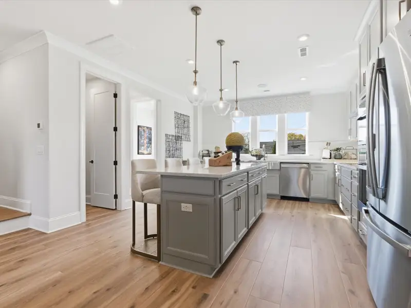 Furnished interior view inside a new home in Ross Farms, Charlotte (Image 13).