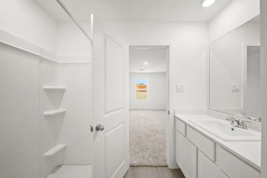 Furnished interior view inside a new home in Lexington Heights, Willis (Image 3).