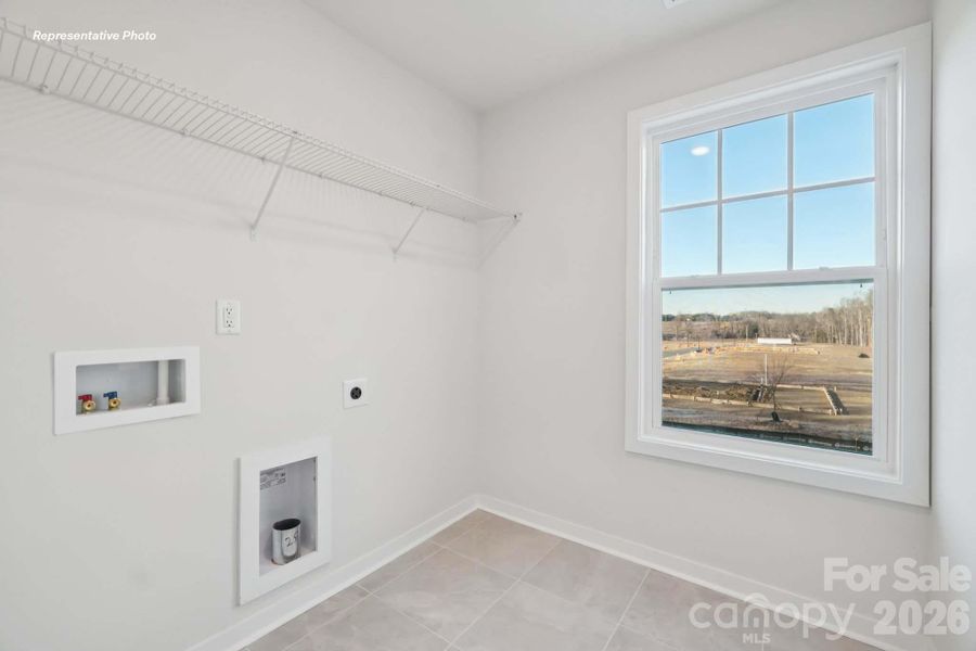 Spacious, unfurnished interior of a new home in Sanctuary at Southgate, Indian Trail (Image 31).