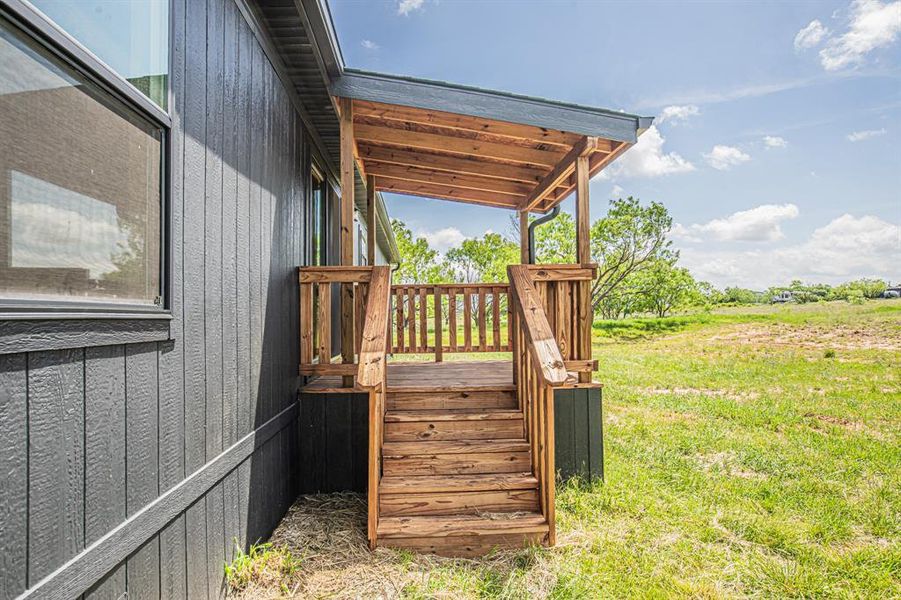 Exterior details and patio area of a home in , Poolville (Image 31).