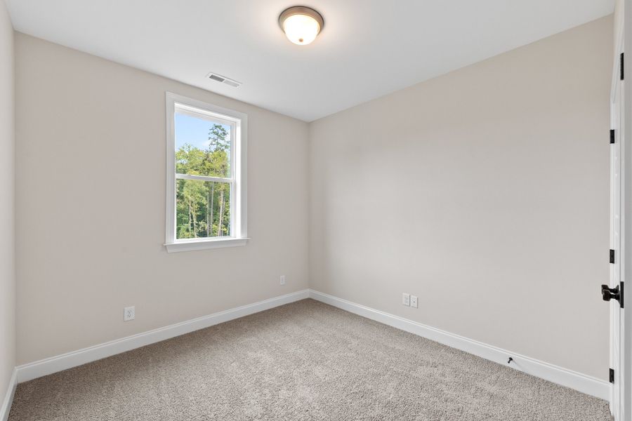 Representative unfurnished interior of a home built from the The Chandler by RobuckHomes in Baylee Ridge, Selma (Image 203).