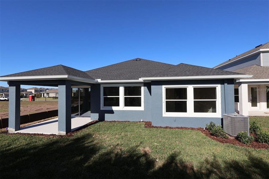 Exterior details and patio area of a home in Waterset Classic Series, Apollo Beach (Image 3).