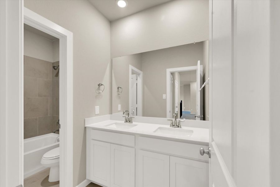 Furnished interior view inside a new home in Sunterra 50s, Katy (Image 19). Furnished interior view inside a new home in Sunterra 50s, Katy (Image 19).