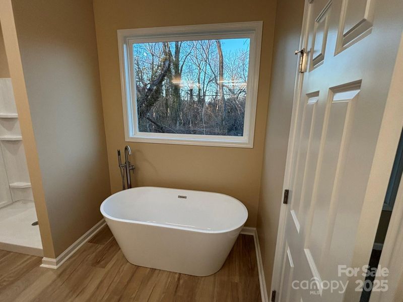 And a soaking with big window for natural lighting and letting go of all of the day's stress. And a soaking with big window for natural lighting and letting go of all of the day's stress.