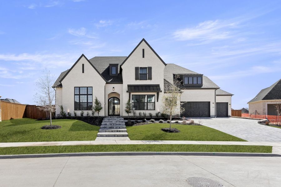 Front exterior of a new home in Mustang Lakes, Celina, TX, highlighting curb appeal (Image 1). Front exterior of a new home in Mustang Lakes, Celina, TX, highlighting curb appeal (Image 1).