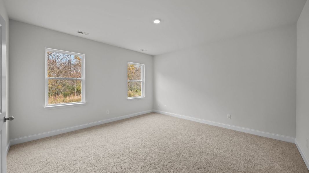 Spacious, unfurnished interior of a new home in Villa Grande, Winterville (Image 27).