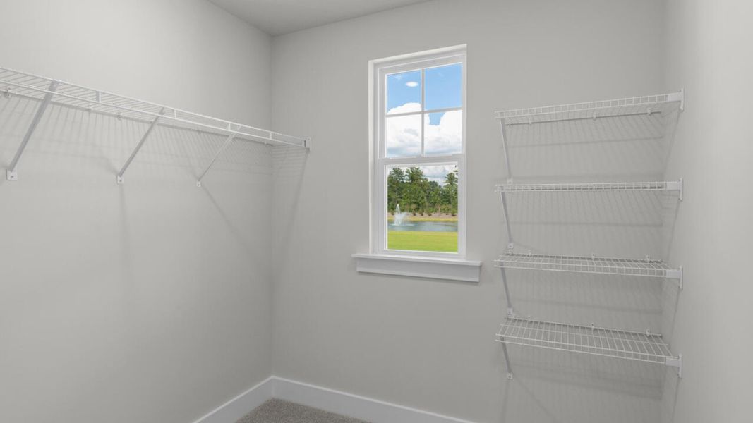 Representative furnished interior of a home built from the CARDINAL by D.R. Horton in Indigo Preserve Townhomes, Leland (Image 13).