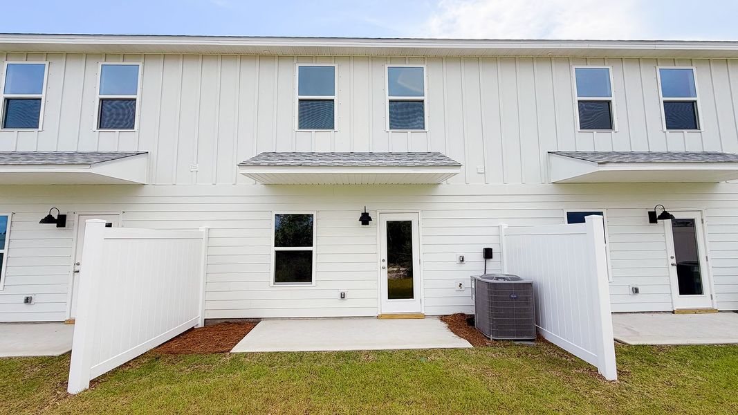Exterior details and patio area of a home in Salt Creek Townhomes at Mexico Beach, Mexico Beach (Image 3). Exterior details and patio area of a home in Salt Creek Townhomes at Mexico Beach, Mexico Beach (Image 3).