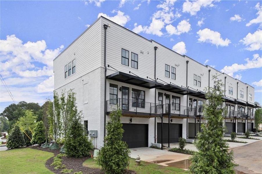 Front exterior of a new home in , Alpharetta, GA, highlighting curb appeal (Image 24).