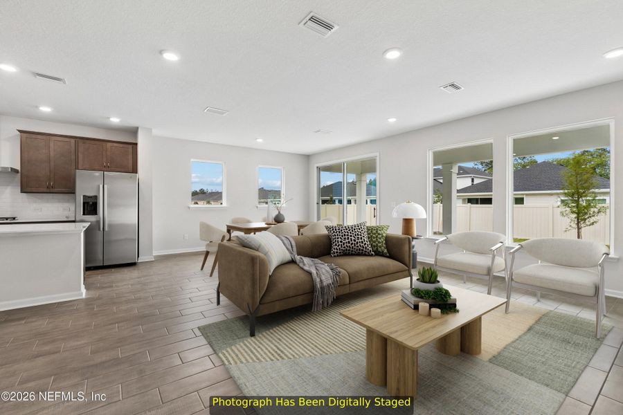 Furnished interior view inside a new home in Tributary 50', Yulee (Image 7).