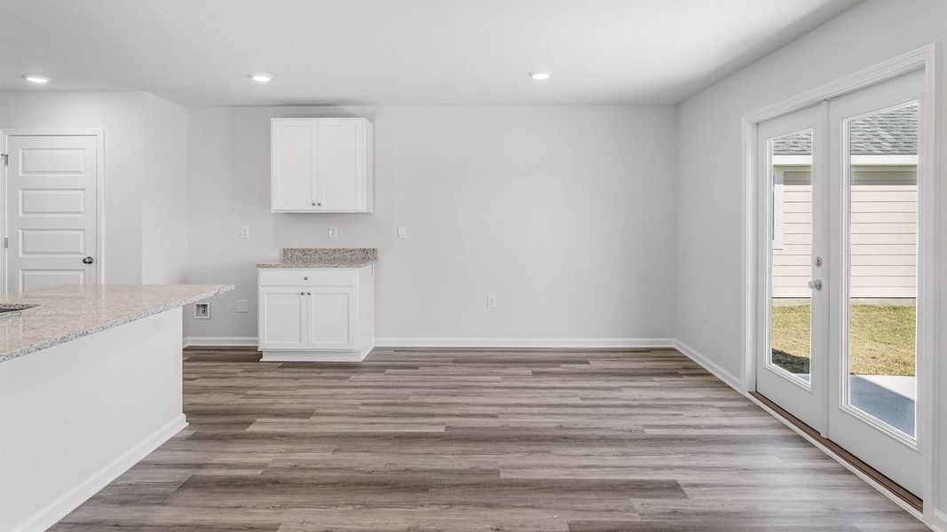 Representative unfurnished interior of a home built from the The Aisle by D.R. Horton in Chateau Nemours, Port Saint Joe (Image 24).