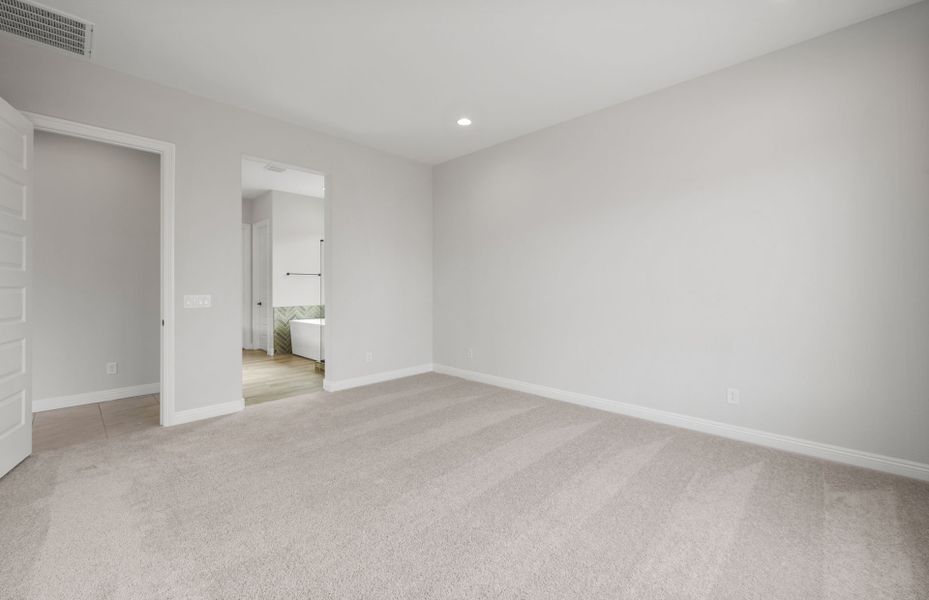 Spacious, unfurnished interior of a new home in Artisan at Asante, Surprise (Image 21).