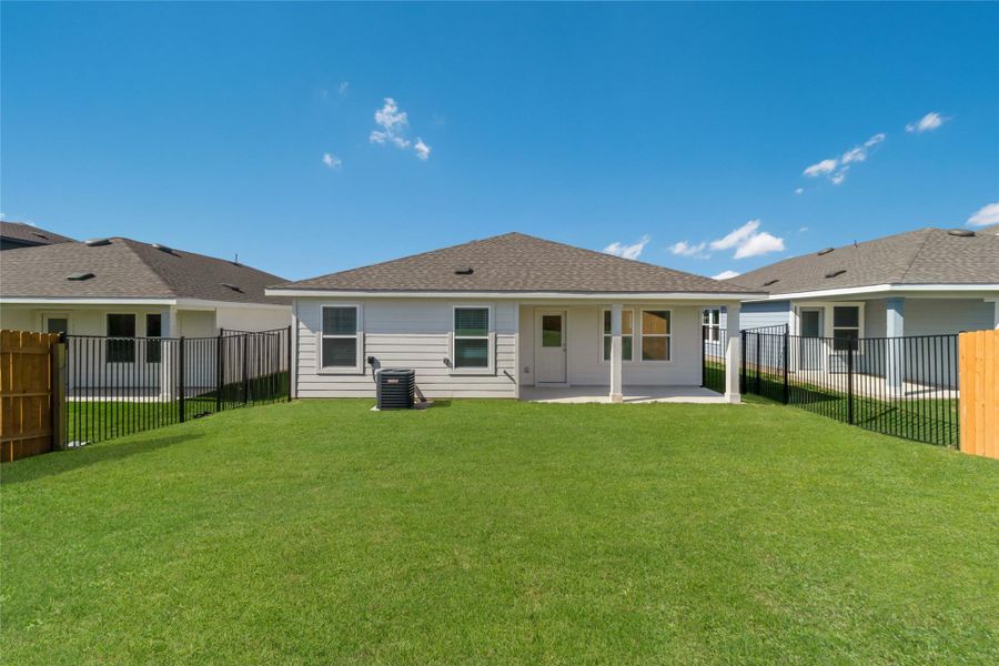 Exterior details and patio area of a home in Trails at Wildhorse, Austin (Image 3).