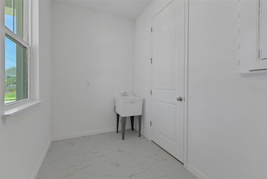 Furnished interior view inside a new home in Crossroads at Kelly Park, Apopka (Image 12).