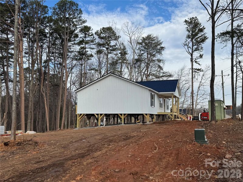 Current side view before siding is completed to ground level