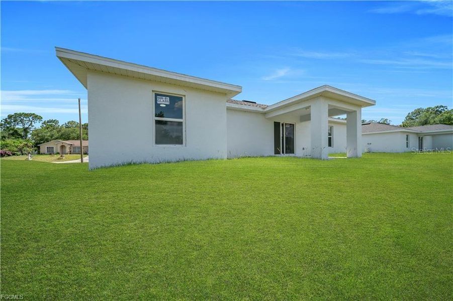 Exterior details and patio area of a home in , Lehigh Acres (Image 21).