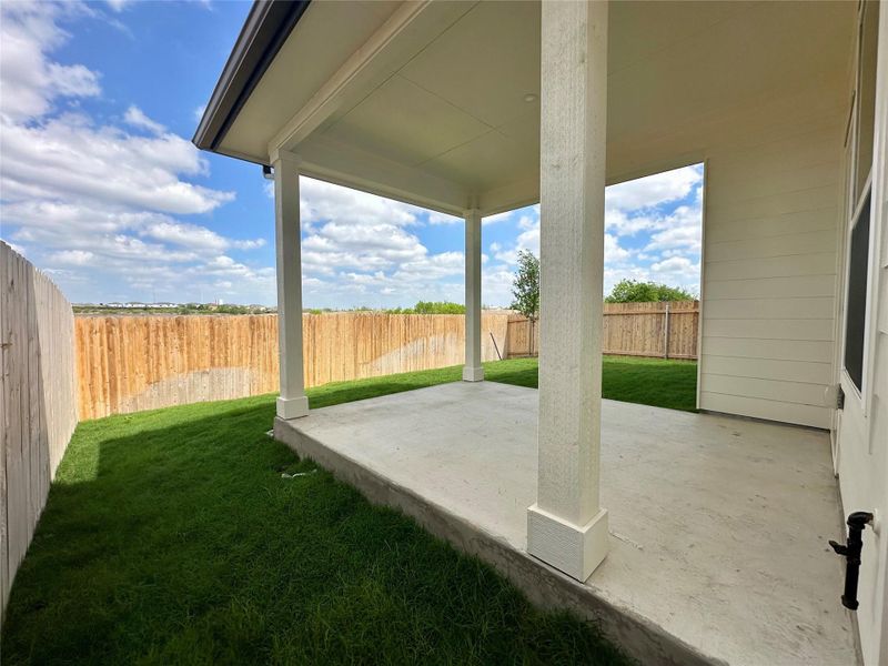 Exterior details and patio area of a home in Porter Country, Buda (Image 3).