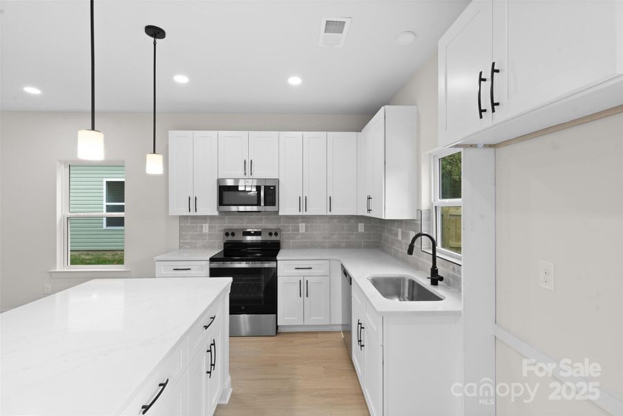 Furnished interior view inside a new home in , Charlotte (Image 11).