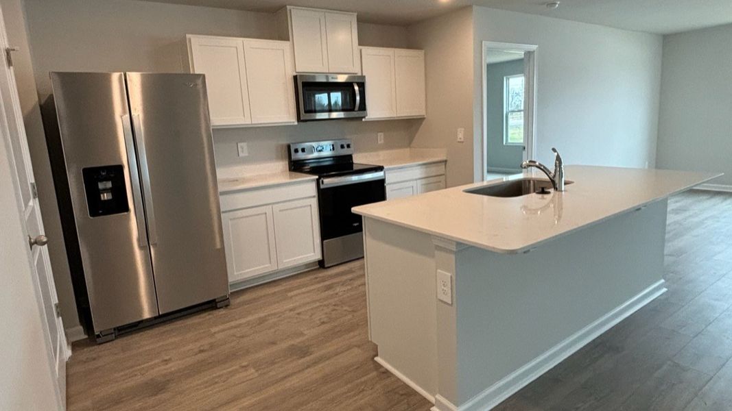 Representative furnished interior of a home built from the ARIA by D.R. Horton in Savannah Lakes, Lewisburg (Image 26).