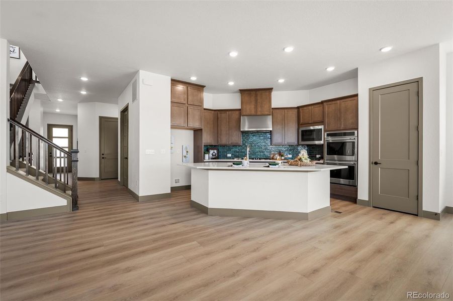 Furnished interior view inside a new home in Revel Crossing at Wolf Ranch - The Panorama Collection, Colorado Springs (Image 4).