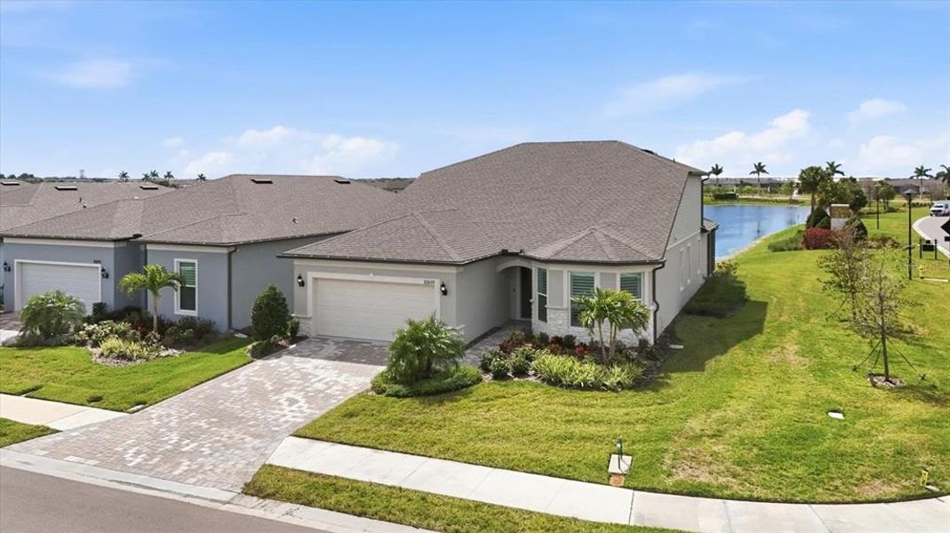 Front exterior of a new home in , Parrish, FL, highlighting curb appeal (Image 19).