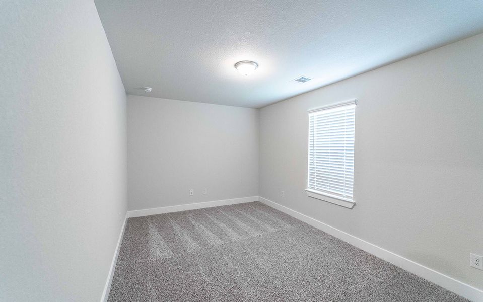 Spacious, unfurnished interior of a new home in Canterra Creek, Rosharon (Image 45).