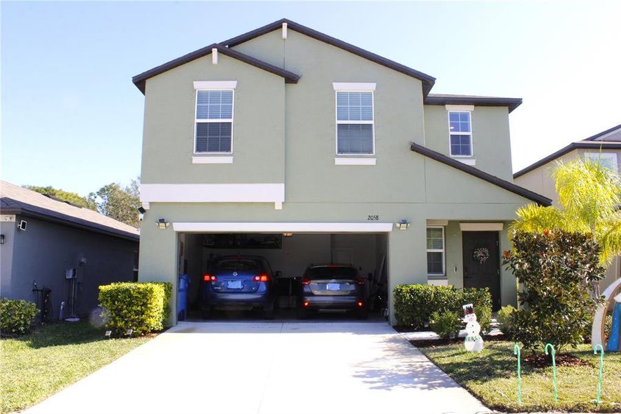 Front exterior of a new home in , Lutz, FL, highlighting curb appeal (Image 31). Front exterior of a new home in , Lutz, FL, highlighting curb appeal (Image 31).