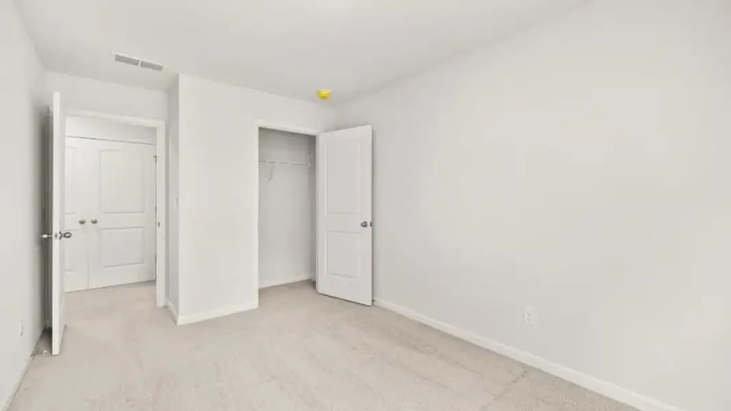 Spacious, unfurnished interior of a new home in Woodbury Park, South Fulton (Image 22).