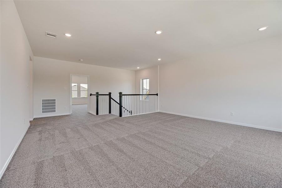 Spacious, unfurnished interior of a new home in Valencia On The Lake, Little Elm (Image 33).