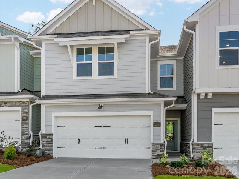 Front exterior of a new home in Westview Towns, Waxhaw, NC, highlighting curb appeal (Image 18).