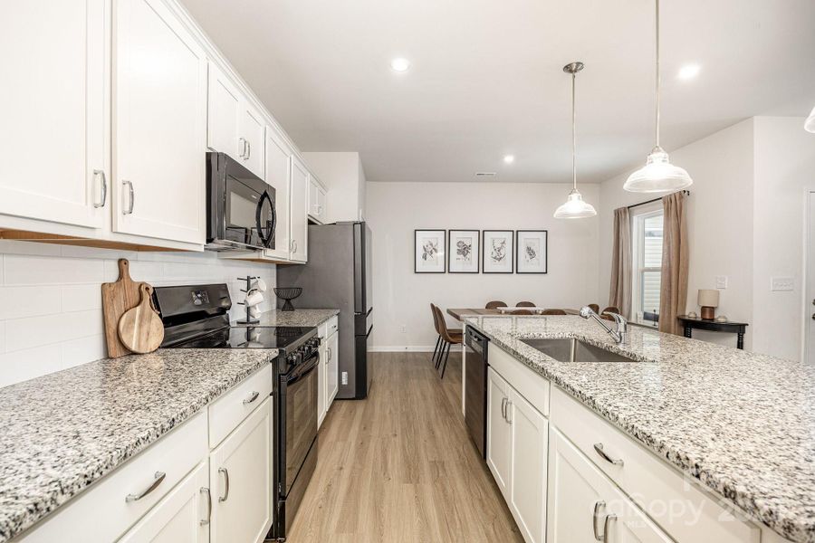 Furnished interior view inside a new home in , Salisbury (Image 7).