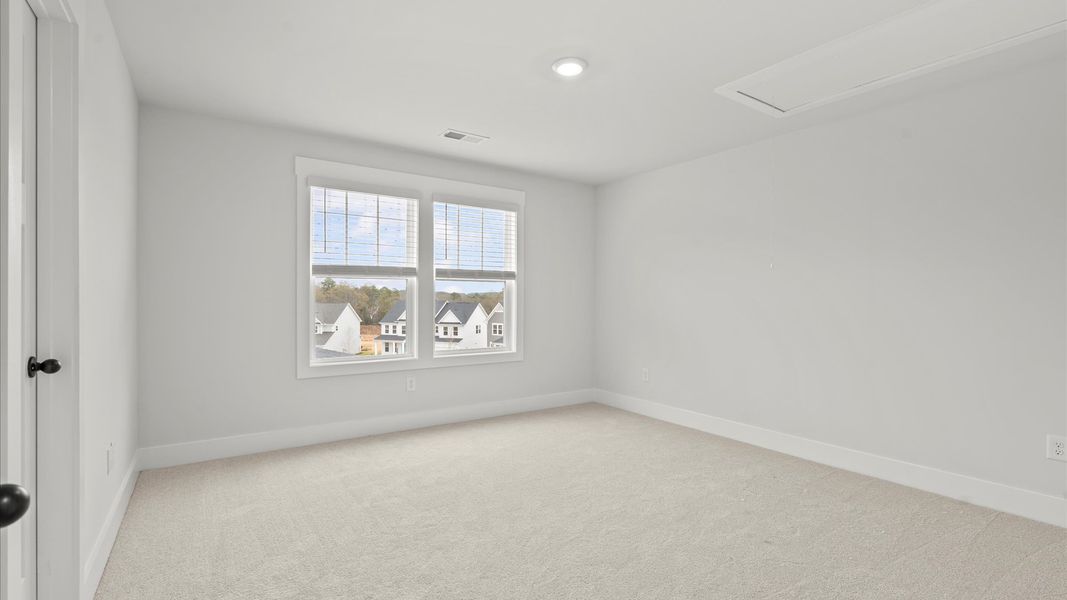 Vibrant and restful bedroom with oversized windows, refined detail, and a warm, welcoming atmosphere Vibrant and restful bedroom with oversized windows, refined detail, and a warm, welcoming atmosphere