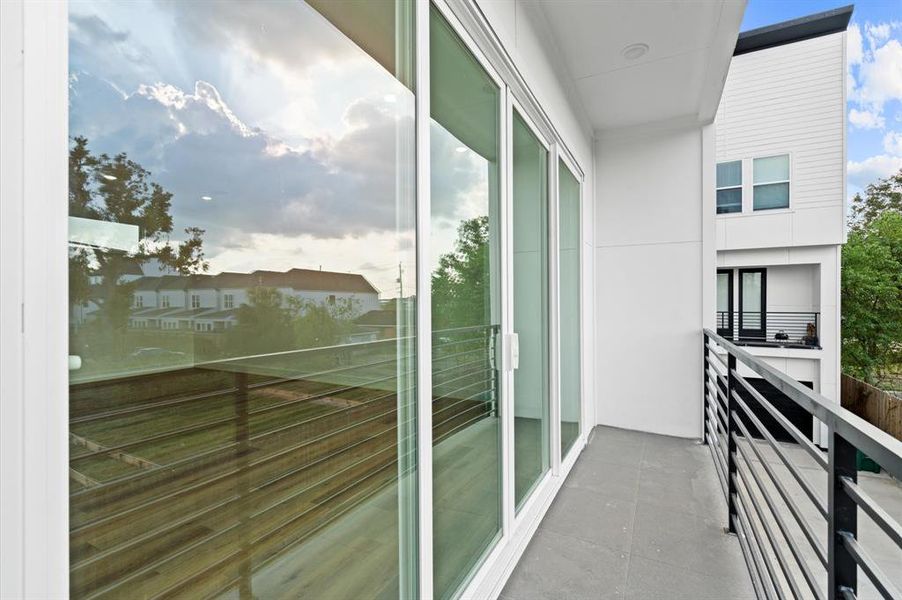 Balcony with large Sliding glass doors