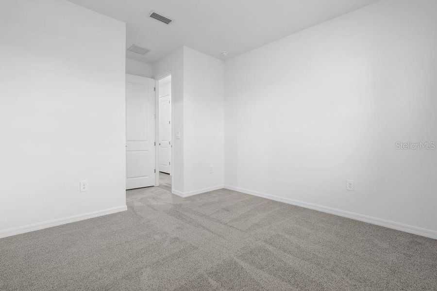 Spacious, unfurnished interior of a new home in The Cove at West Port, Port Charlotte (Image 23). Spacious, unfurnished interior of a new home in The Cove at West Port, Port Charlotte (Image 23).