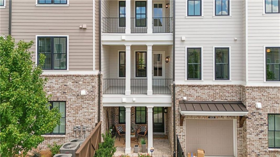 Front exterior of a new home in Waterside Condos, Peachtree Corners, GA, highlighting curb appeal (Image 2).
