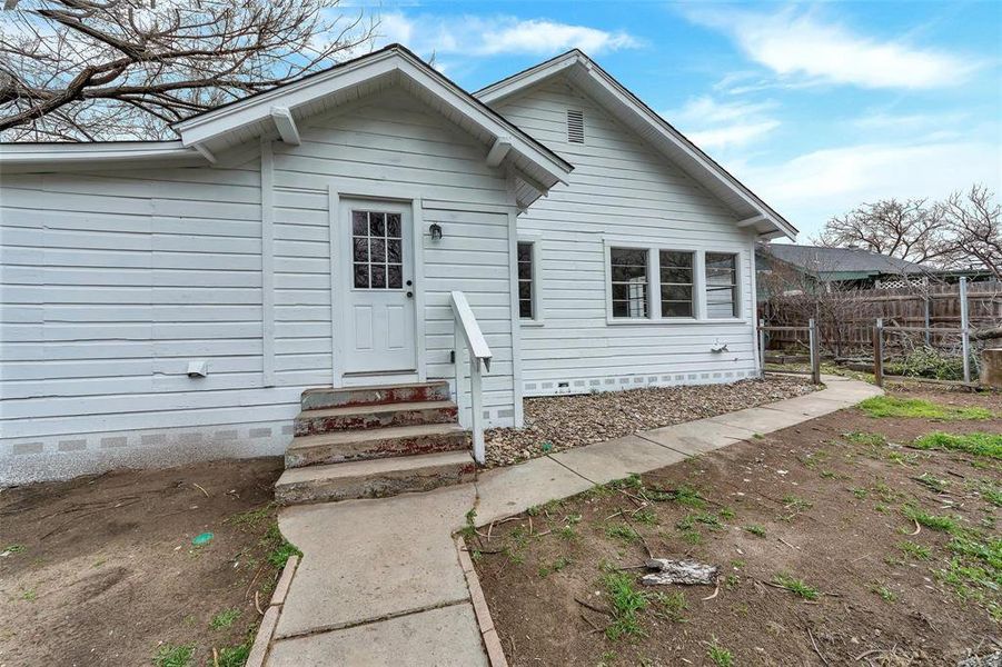 View of front of home featuring entry steps and crawl space View of front of home featuring entry steps and crawl space